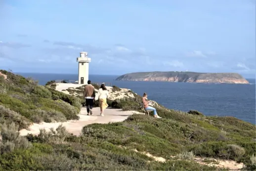 image depicting Dating Connect couple walking along the coastline